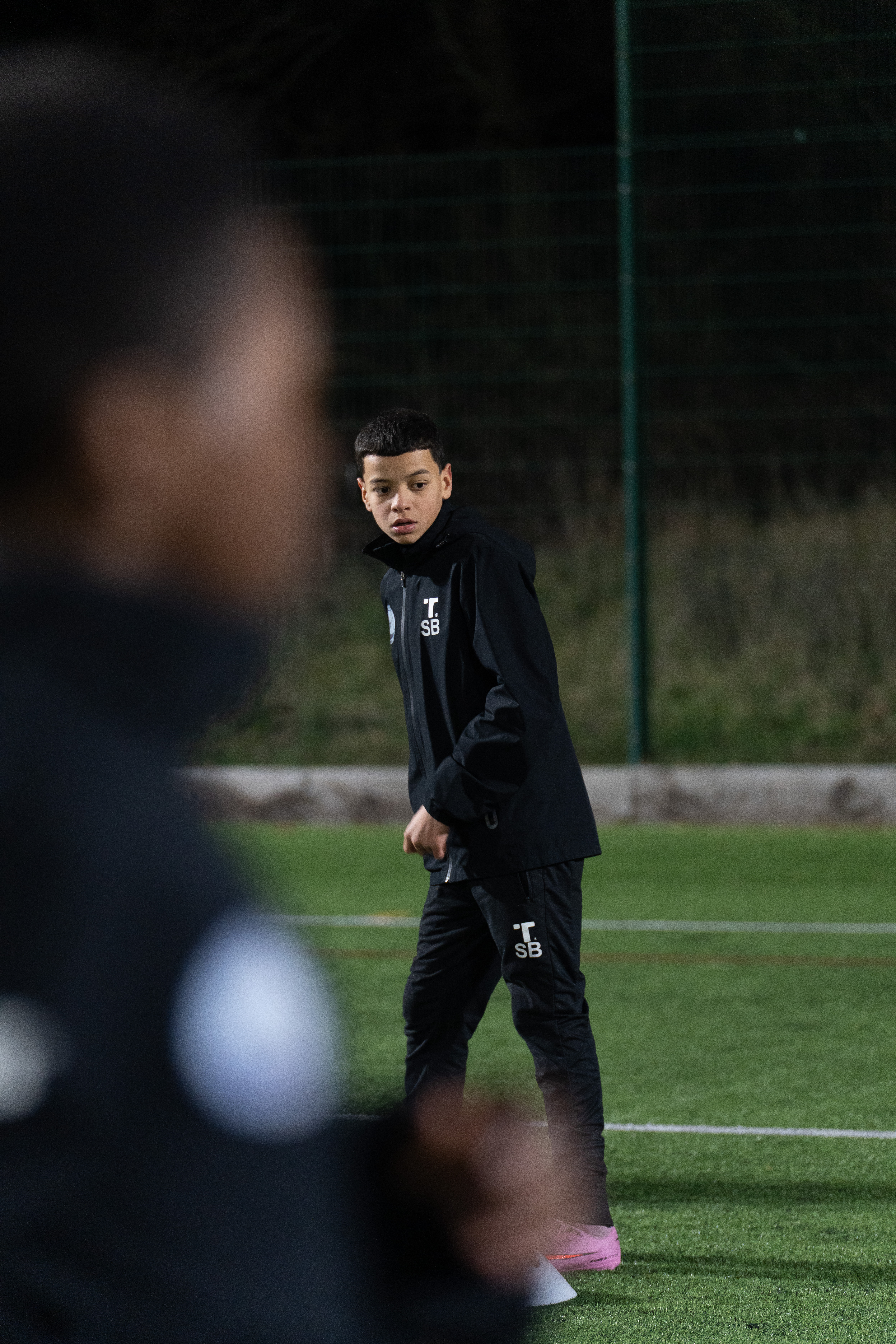 Youth Football Training at Night