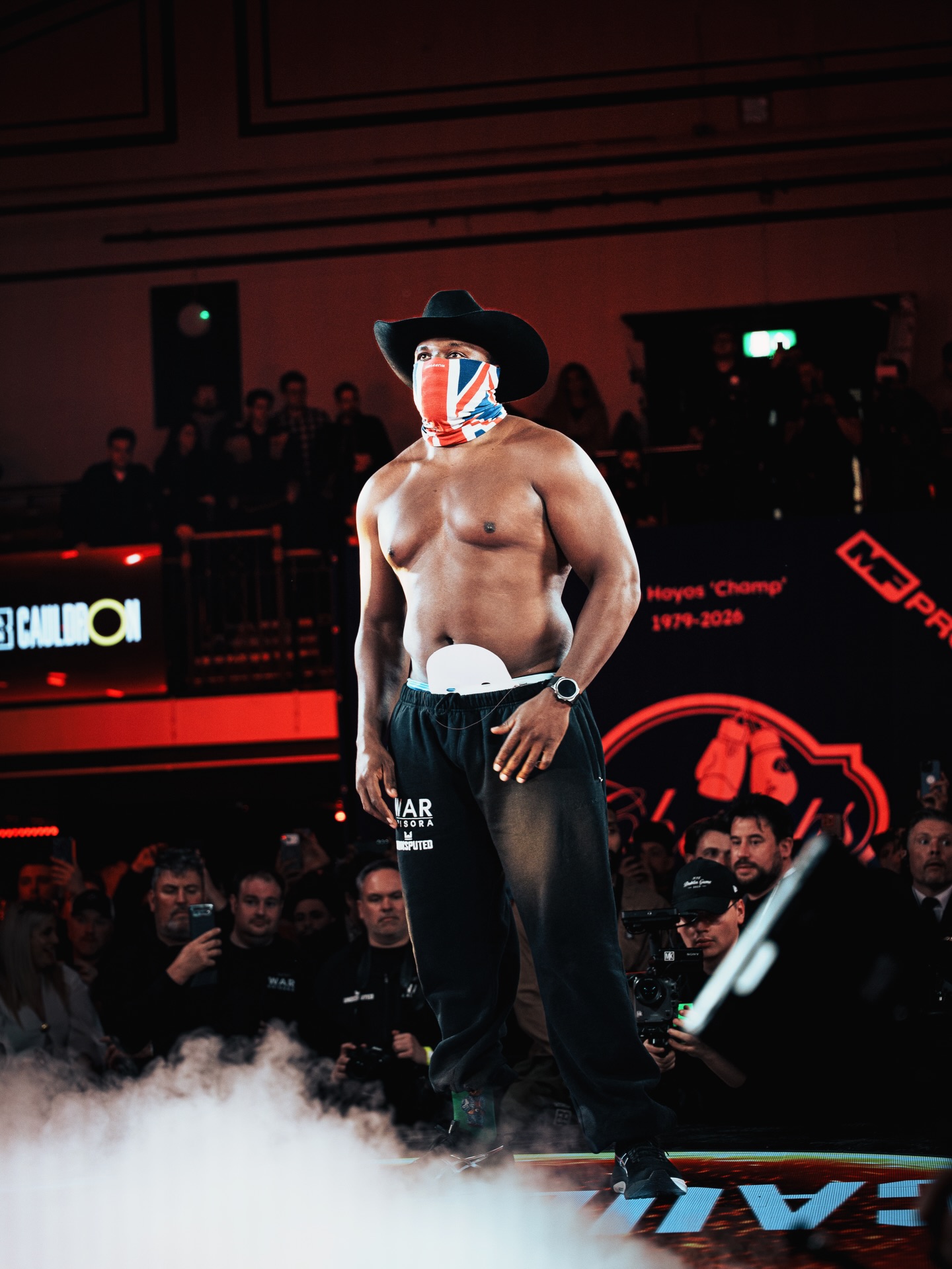 Masked boxer making a dramatic ring entrance